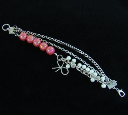 Pulseira com perolas rosa